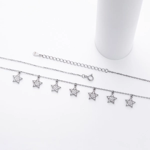 Detail showing S925 sterling silver pentagram pendants with sparkling white zircons