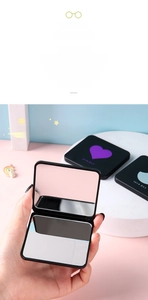 Black folding mirror featuring a purple heart design and double-sided magnification