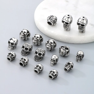 Various retro silver stainless steel skull beads for DIY Halloween jewelry making