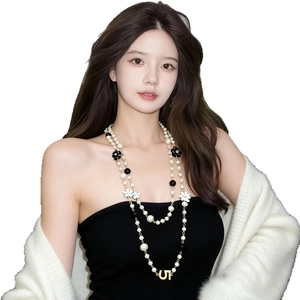 Long double-layer pearl necklace with black and white flowers and letter charm for women