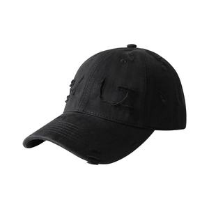 Distressed black cotton baseball cap with vintage ripped details and a soft top design