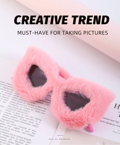 Detailed shot of pink faux fur cat eye sunglasses made of durable full PC material