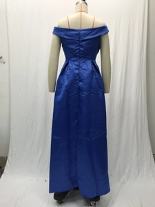 Detail view of the back design on a dark blue satin strapless V-neck maxi evening dress
