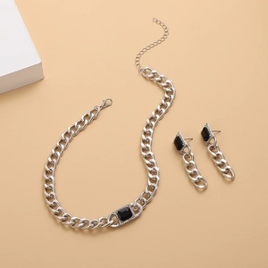 Silver chunky chain jewelry set with black rectangular gemstone necklace and earrings