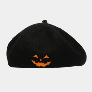 Black wool Halloween beret featuring a detailed orange embroidered pumpkin face