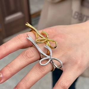 Elegant adjustable bow open rings with sparkling crystals in gold and silver finish