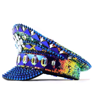 Punk style Klein blue captain hat with colorful sequins, blue spikes, and rhinestones