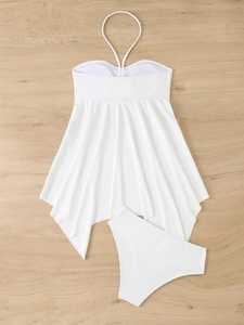 Detail of white ribbed fabric texture on a halter neck two-piece tankini set