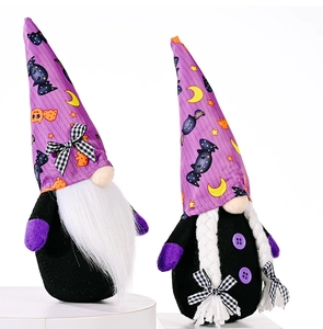 Close-up of Halloween gnomes with purple bat print hats and checkered bows detail