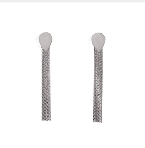 Detailed close-up of shiny silver long tassel drop earrings in a minimalist vertical design