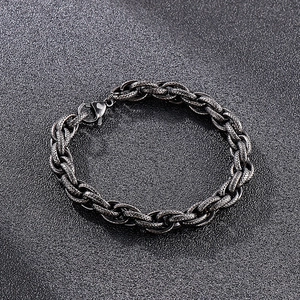 Macro detail of vintage silver stainless steel chain bracelet with textured finish and clasp