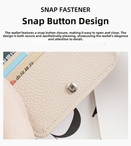 Detail shot of beige lychee grain leather wallet with silver metal snap button and card slots
