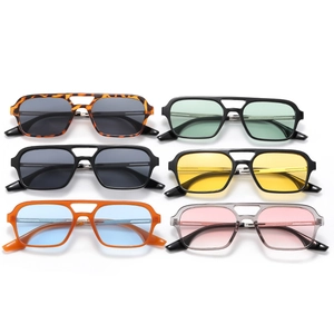 Detail of pilot-style sunglasses in six color variations with double-bridge frames
