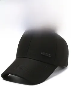 Detail view of structured black baseball cap with side logo tag and curved brim