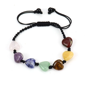Detail of handmade adjustable black rope bracelet with seven colorful heart-shaped gemstones