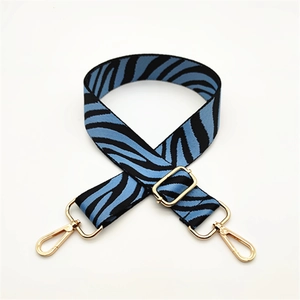 Blue and black zebra print bag strap with adjustable length and gold hardware