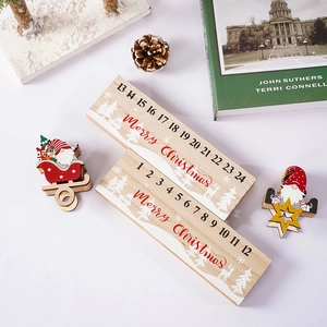 Flat lay of wooden Christmas countdown calendar with gnomes and numbered blocks