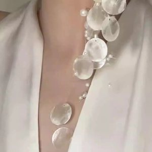 Elegant circular shell pearl tassel clip earrings for women in seaside resort style