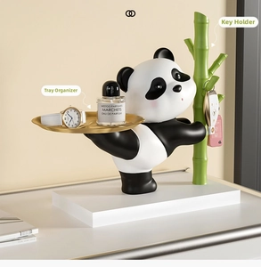 Panda sculpture organizer with gold tray and bamboo hanger for keys and small items