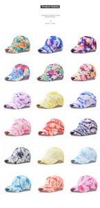 Matrix display of tie-dye baseball caps in eighteen vibrant gradient color variations