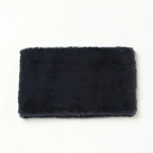 Detailed close-up of dark navy faux rabbit fur neck warmer showing soft plush texture