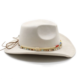 Close-up of beige suede cowboy hat featuring a colorful beaded ethnic weave band