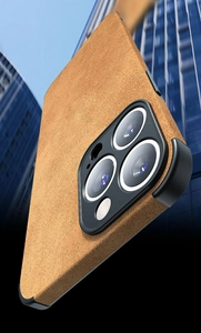 Close-up of brown litchi leather texture phone case for iPhone with urban building background