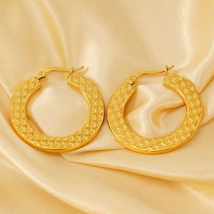 Exaggerated large golden stainless steel hoop earrings with embossed star pattern for women