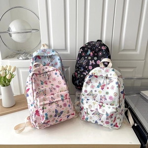 Zaini carini con stampe di fiori e farfalle in rosa, bianco, blu e nero per scuola