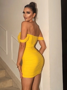 Side view of a sexy yellow bodycon dress with off-the-shoulder design and ruched details