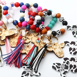 Colorful silicone bead keyring with cow print cow head tag and leather tassel