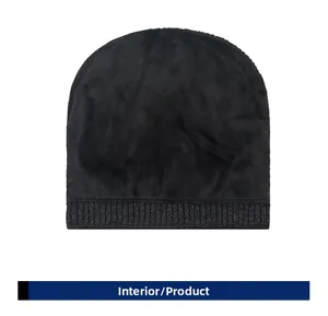 Close-up of winter knit hat showing thick black faux fur lining and thermal insulation
