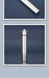 Close-up of a silver waterproof stainless steel toothpick container with a key ring