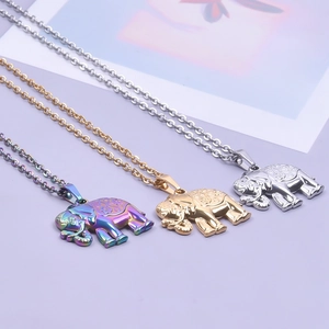 Detailed view of elephant pendants in rainbow, gold, and silver finishes on steel chains