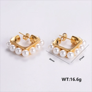 Elegant 28mm golden stainless steel C-shaped earrings featuring white pearls for women