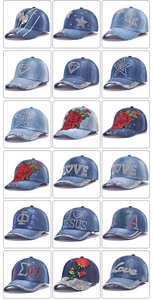 Detail of assorted denim baseball caps featuring intricate rhinestones and embroidery patterns