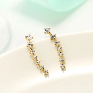 Elegant gold curved stud earrings featuring sparkling white zircon row stones for women