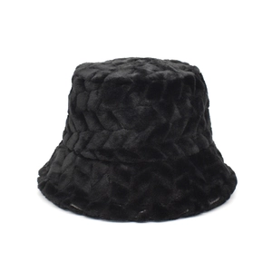 Detail view of black faux plush bucket hat featuring a unique zigzag textured pattern