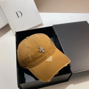 Distressed vintage cotton baseball cap with a metal cross detail in a black gift box