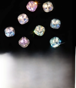 Macro detail of 6mm cushion cut crystal stud with titanium steel base and reflective coating