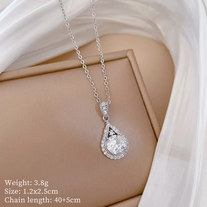 Silver teardrop pendant necklace with sparkling crystals and size details on 40cm chain