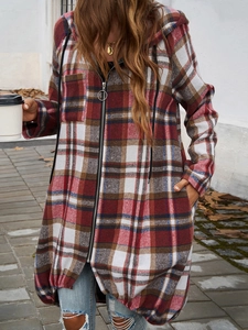 Detail showing the plaid pattern texture and zipper closure of the hooded long jacket