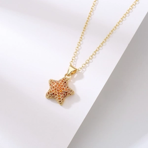 18K gold plated star pendant necklace with orange zircon stones on thin gold chain
