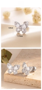 Macro detail of butterfly stud earrings with pear-shaped crystals and 1.15cm width size