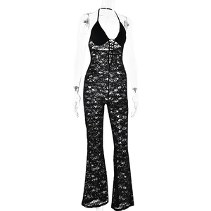 Close-up of black lace halter jumpsuit featuring a deep V-neck and lace-up chest detail