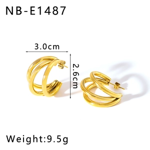 Detail view of gold layered hoop earrings with dimensions 3.0cm width and 2.6cm height