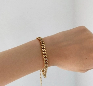French style 18K gold plated titanium steel wide chain bracelet worn on a female wrist