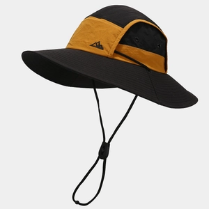 Detail of adjustable windproof rope and metal ventilation holes on outdoor sun hat