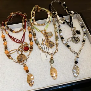 Bohemian multi-layer necklace set with vintage coins, colorful beads and geometric charms