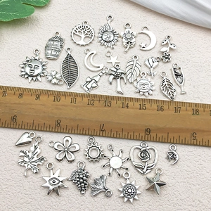 Vintage silver alloy charms assortment with moon sun and star for DIY jewelry making